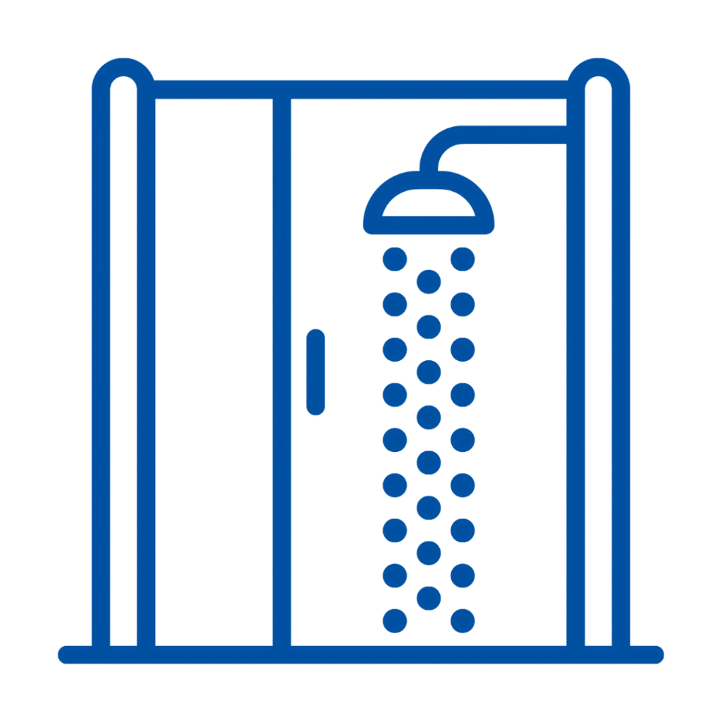 Frameless shower enclosure featuring sleek tempered glass design, enhancing modern bathroom aesthetics and functionality.