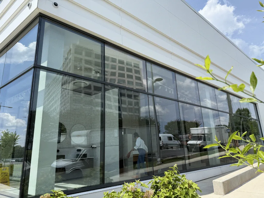 A finished commercial glass curtain wall installed by American Glass and Doors