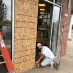 Storefront boarded up the same night as the break-in