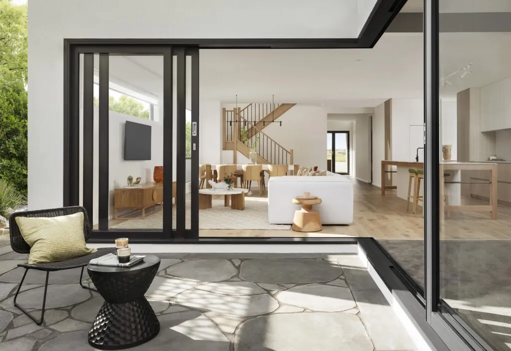 A contemporary building elevation glazed floor to ceiling in large modern panels