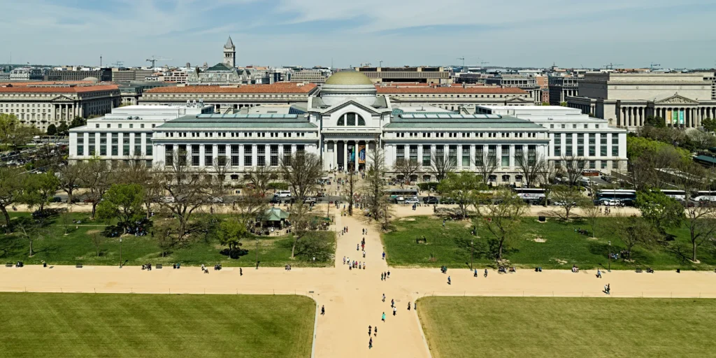 Aerial view of a large building and green space, suitable for Commercial Door Repair services in DC | American Glass and Door.